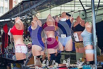 LEUVEN, BELGIUM - SEPTEMBER 05, 2014: Selling of ladies` underwear at the Grote Markt Main Market in Leuven. Editorial Stock Photo