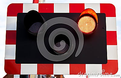 Level crossing lights signalling to stop Stock Photo
