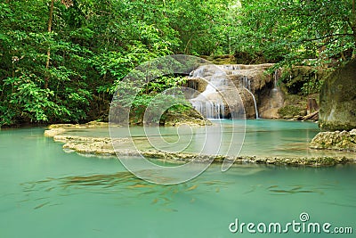 Level 1 of Erawan Waterfall with Neolissochilus stracheyi fish i Stock Photo