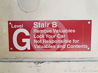 Level G stair B remove valuables red sign on wall Stock Photo