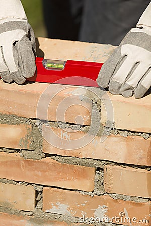 Leveling the masonry bricks Stock Photo