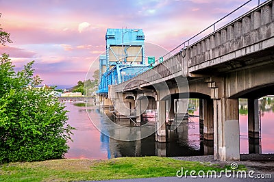 Lewiston - Clarkston blue bridge against sky with pink clouds on the border of Idaho and Washington states Stock Photo