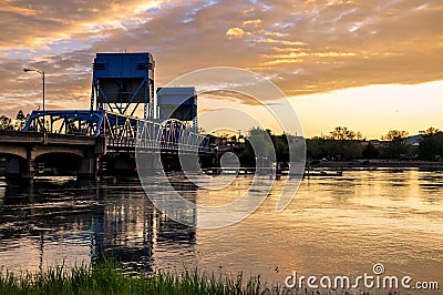 Lewiston - Clarkston blue bridge against vibrant evening sky on the border of Idaho and Washington states Stock Photo