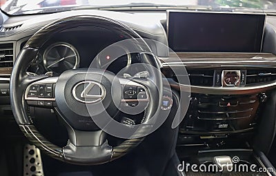 Lexus LX 570 III steering wheel and dashboard. Black leather interior of the SUV. The modern interior of a premium SUV. Editorial Stock Photo