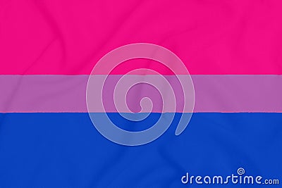 LGBT Bisexual pride community flag on a textured fabric. Pride symbol Stock Photo