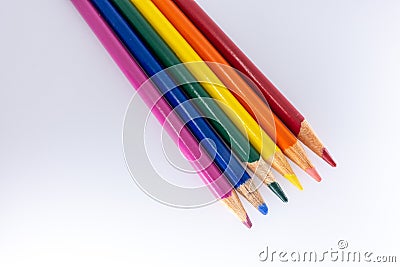 LGBT and Gay Pride rainbow colored pencils against a white background. Equality and Diversity concept - image Stock Photo