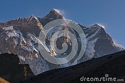 Lhotse mountain peak at sunrise, Everest region, Nepal Stock Photo