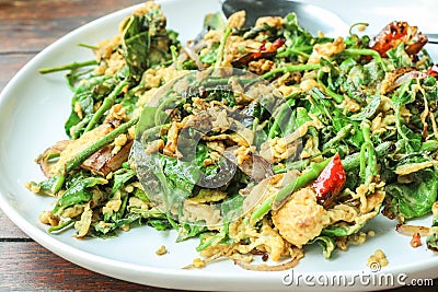 Liang leaves fried with eggs - Stir fried vegetable with egg men Stock Photo