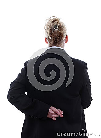 Liar businesswoman with crossed fingers at back Stock Photo