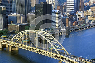 Liberty Bridge over Monongahela River at sunset with Pittsburgh skyline, PA Editorial Stock Photo