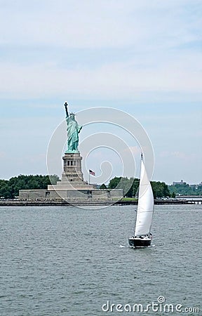 Liberty statue and ship Stock Photo