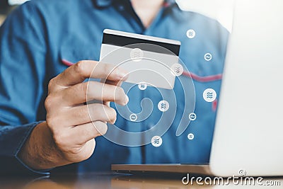 Libra Cryptocurrency Online banking businessman using Laptop with credit card online shopping , Fintech and Blockchain concept Editorial Stock Photo