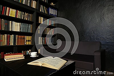 Library with books black Office with table Editorial Stock Photo