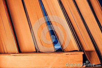 Library stack of old books in antique shop, bookstore. Literature, knowledge. Stock Photo