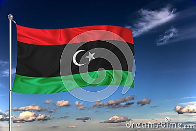 Libya national flag waving in the wind against deep blue sky. International relations concept Stock Photo