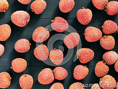 Lichee fruit on dark wooden background Stock Photo