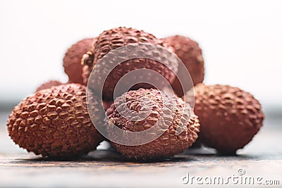 Lichee on wooden table, litchi, lychee fruit detail Stock Photo