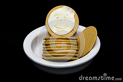Licked Cream Filling Face in a Yellow Cookie Stock Photo