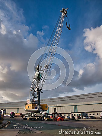 A Liebherr mobile harbour crane at the West Float Dock in Birkenhead, Merseyside, UK Editorial Stock Photo