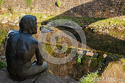 Lierganes, Cantabria, Spain. 05-25-2019. Monument to the Man Fish. Monumento al hombre Pez. River Miera. Mythology of Cantabria. Editorial Stock Photo