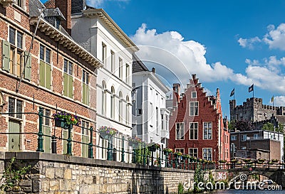 Lieve River leads along bourgeois mansions to castle, Gent, Flanders, Belgium Stock Photo