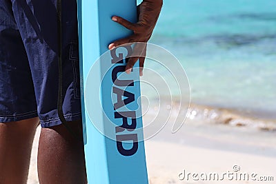 Life guard on duty at beach Stock Photo