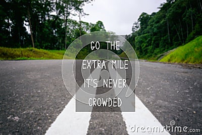 Life Inspirational Quotes - Go the extra mile it`s never crowded Stock Photo