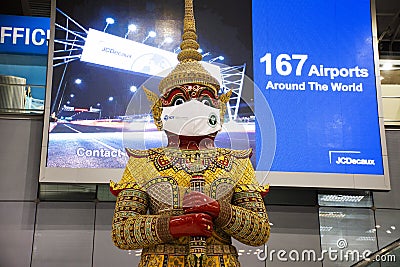 Life lifestyle new normal and yaksha guardian or titan giant keeper wearing mask while Coronavirus COVID 19 outbreak at Editorial Stock Photo