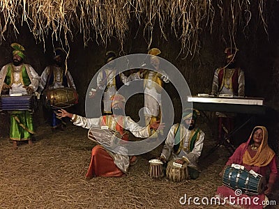 Life like wax sculpture of folk dancers from Punjab Editorial Stock Photo