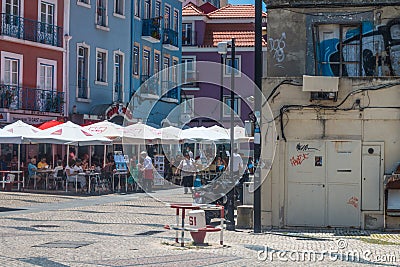 Daily life in one of the most popular neighborhood in Lisbon, Almada Editorial Stock Photo