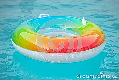 Life resque rubber circle in swimming pool. Help concept. Summer vacation. Rubber circle, aquapark, swimming pool Stock Photo