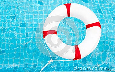 Life Ring at the swimming pool. Life Ring on water. Life Ring on Stock Photo