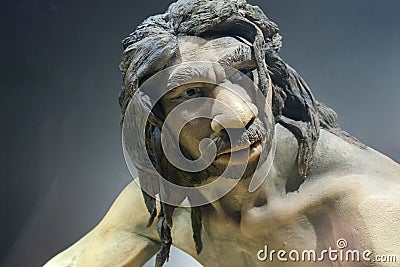 Life-sized sculpture of Homo heidelbergensis Editorial Stock Photo