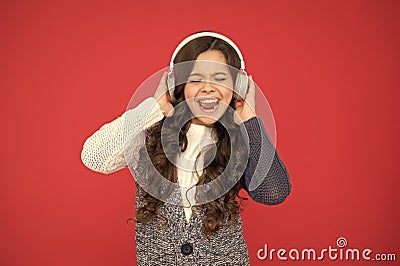 Life is song, sing it. Happy child sing song red background. Little girl listen to song in headphones. Modern life. New Stock Photo