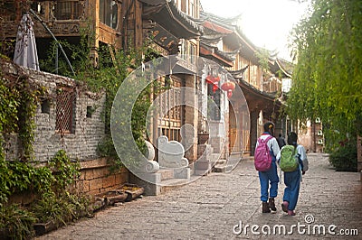 Daily life on street in Lijiang Dayan old town. Editorial Stock Photo