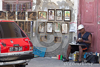 Life on the streets of Mindelo. Artist Editorial Stock Photo