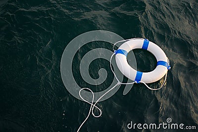 Lifebelt, lifebuoy in a dangerous sea for help, safety,security Stock Photo