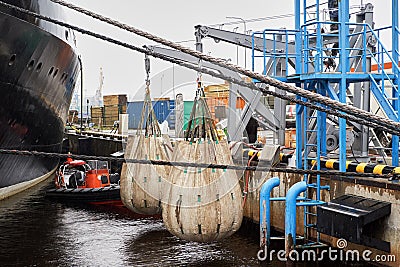 lifeboat davit load test water filled weight bags Stock Photo