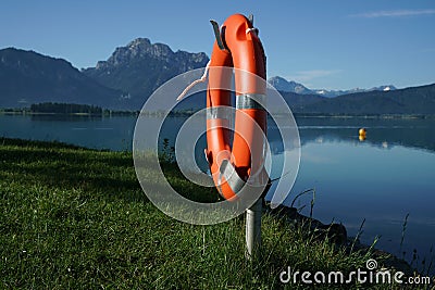 Lifebuoy hanging next to a sea Stock Photo