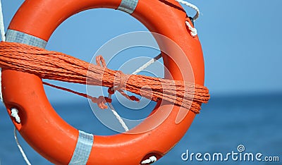 Lifebuoy with rope to rescue swimmers Stock Photo