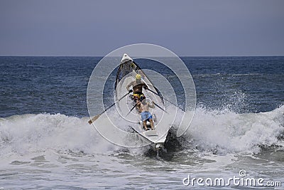 lifeguard dory surf race editorial photography - image