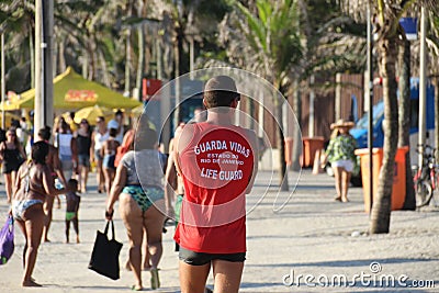 Lifeguard patrols at Arpoador Beach Editorial Stock Photo
