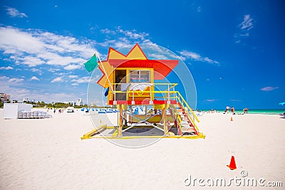 Lifeguard tower in a colorful Art Deco style, with blue sky and Atlantic Ocean in the background. World famous travel location. So Editorial Stock Photo