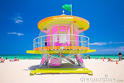 Lifeguard tower in a colorful Art Deco style, with blue sky and Atlantic Ocean in the background. World famous travel location. So Editorial Stock Photo