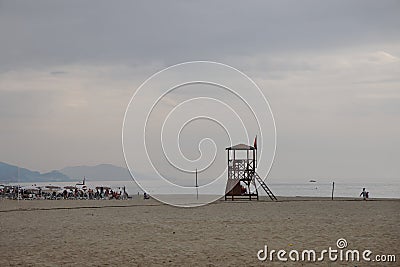 Lifeguard tower on a deserted beach against the background of the sea, minimalism, evening, Alanya, Turkey, October 2021 Stock Photo
