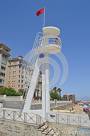 Lifeguard Tower With A Red Flag On The Beach Editorial Stock Photo