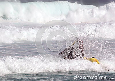 Lifeguards practicing ocean rescues Editorial Stock Photo