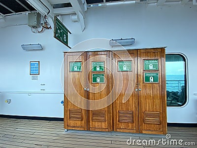 The lifejacket locker on a cruise ship where lifejackets are available in case of an emergency Stock Photo