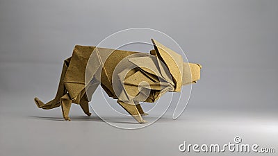 The lifelike origami lion is ready to pounce Stock Photo