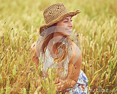 Lifes better in the country. a young woman in a wheat field. Stock Photo